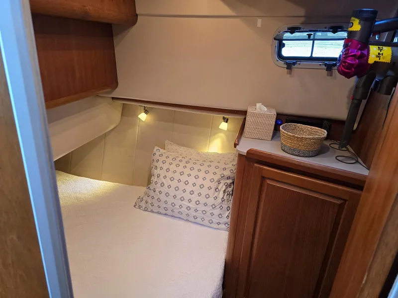 Slide: The Image of Bathroom interior of 1997 Mainship 350 Trawler with shower and sink. - 26