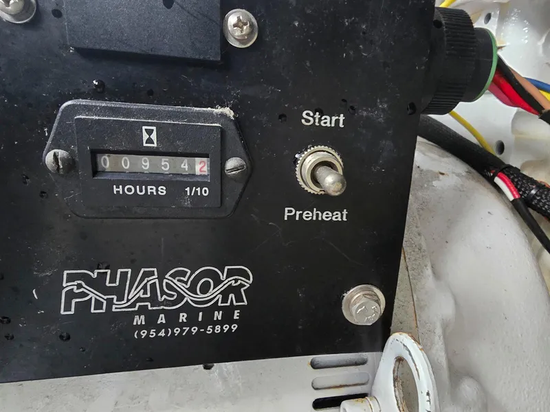 Slide: The Image of Caterpillar engine in a 1997 Mainship 350 Trawler, showcasing detailed mechanical components. - 33