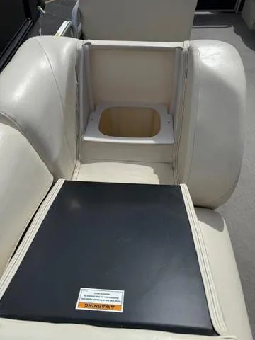 Slide: The Image of 2014 Godfrey 22 Aqua Patio boat seat with storage compartment. - 10