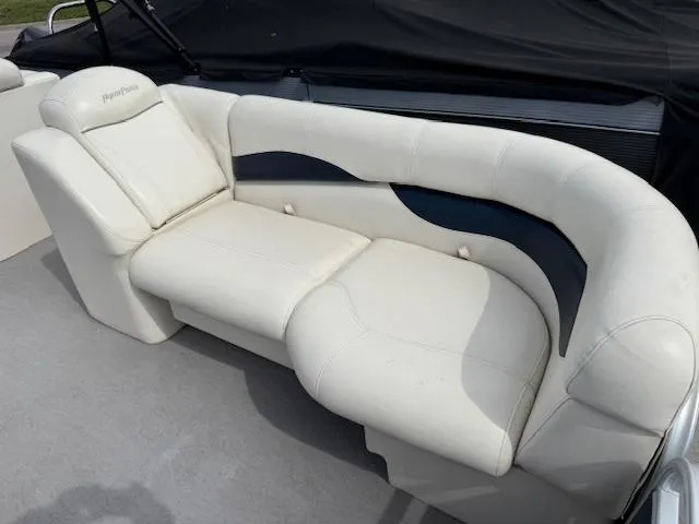 Slide: The Image of White leather seating on 2014 Godfrey 22 Aqua Patio boat. - 4