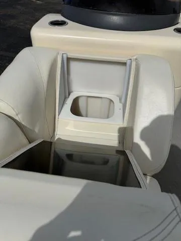 Slide: The Image of 2014 Godfrey 22 Aqua Patio boat seat with storage compartment. - 7