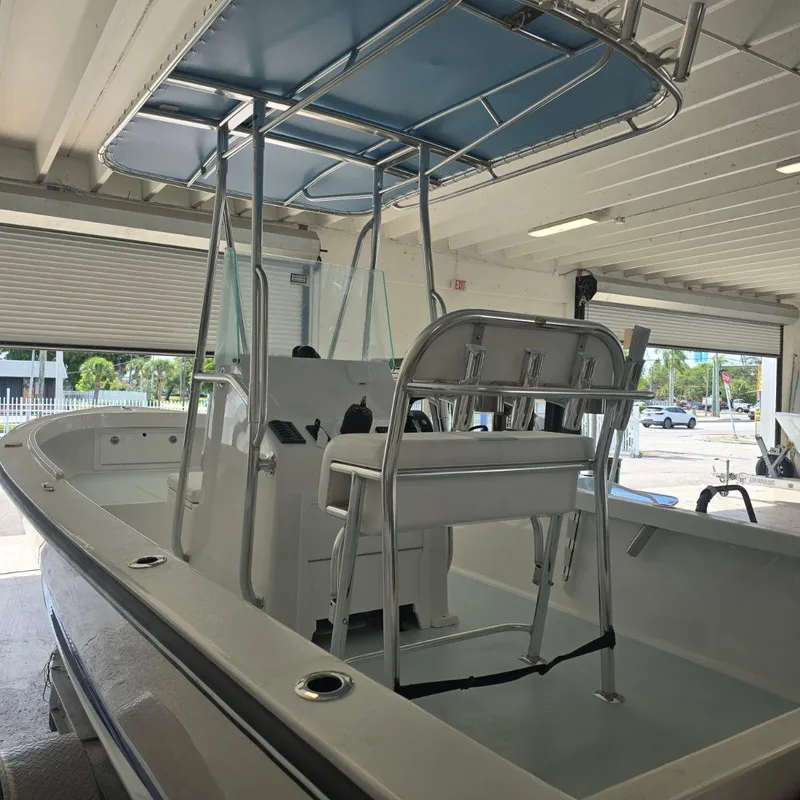 Slide: The Image of 2026 Albury Brothers 20, featuring a sleek white hull and T-top. - 4