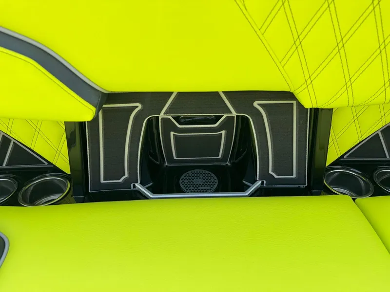 Slide: The Image of Interior of 2025 Tigé 24RZX boat with vibrant lime green upholstery. - 21