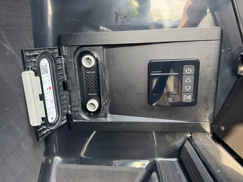 Slide: The Image of Control panel of 2025 Tigé 24RZX boat with inflate and deflate options. - 22