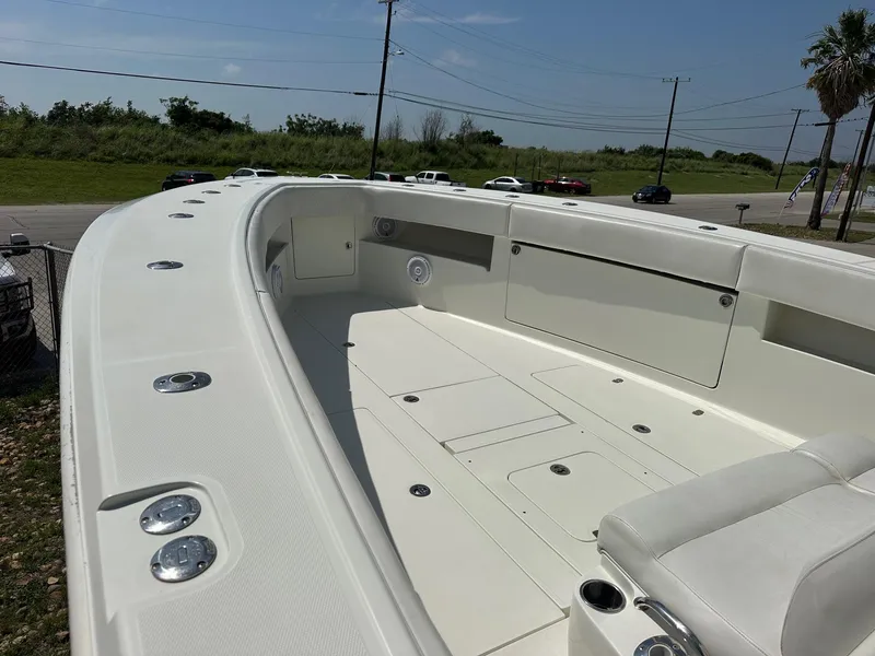 Slide: The Image of 2013 SeaVee 390B boat deck with seating and storage compartments. - 14