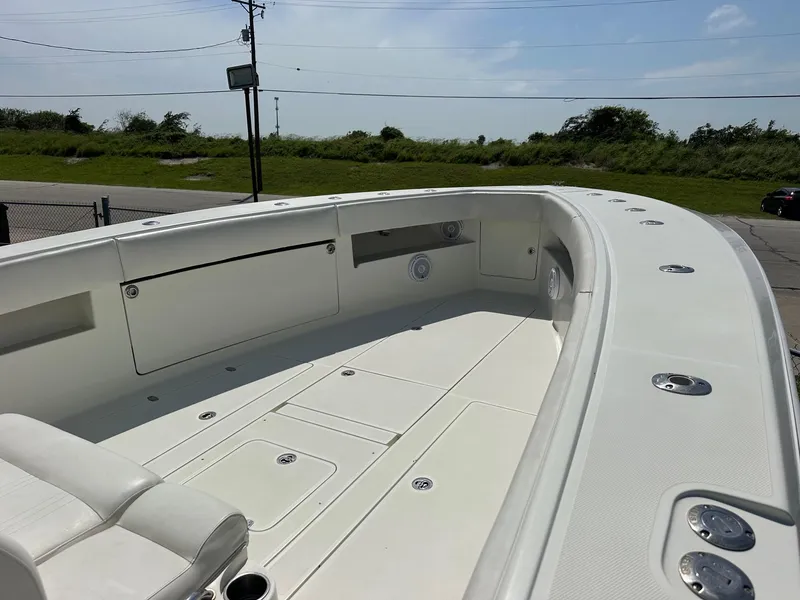 Slide: The Image of 2013 SeaVee 390B boat deck, spacious and well-equipped for fishing or leisure. - 15