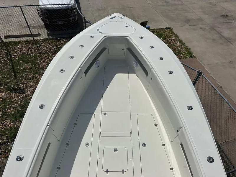 Slide: The Image of 2013 SeaVee 390B boat deck, spacious and well-equipped for fishing or leisure activities. - 16