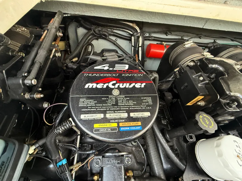Slide: The Image of Engine compartment of a 1997 Sea Ray 290 Sundancer with MerCruiser 4.3L Thunderbolt Ignition. - 15