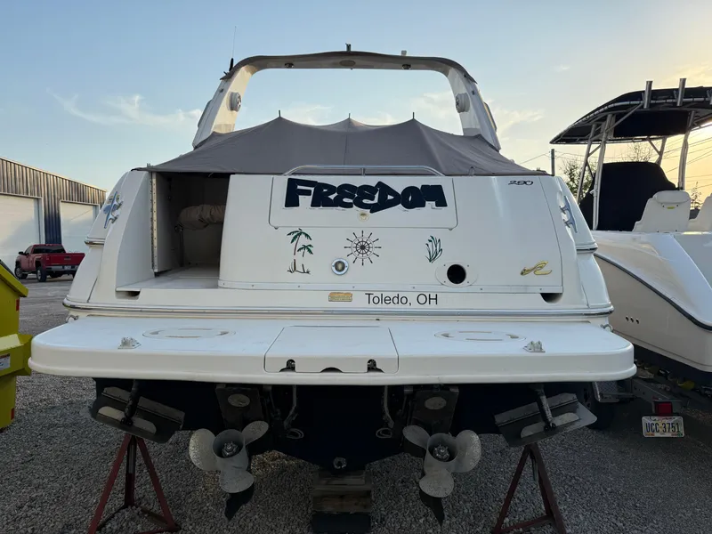 Slide: The Image of 1997 Sea Ray 290 Sundancer boat named "Freedom" docked in Toledo, Ohio. - 3