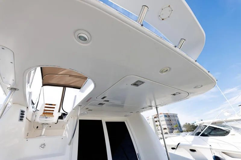 Slide: The Image of 2003 Regal Commodore 3880 yacht deck with modern design and sleek features. - 37