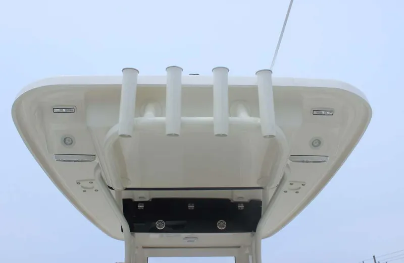 Slide: The Image of T-top view of 2025 Key West 239 FSR boat, featuring rod holders and lights. - 12
