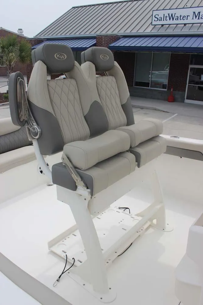 Slide: The Image of 2025 Key West 239 FSR boat seats with gray and beige upholstery at SaltWater Marine. - 13