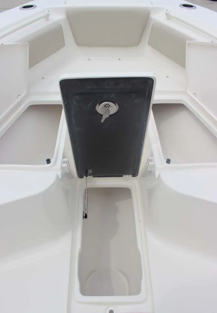 Slide: The Image of 2025 Key West 239 FSR boat interior with storage compartments and sleek design. - 22