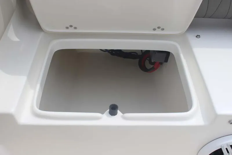 Slide: The Image of Open storage compartment on 2025 Key West 239 FSR boat. - 30