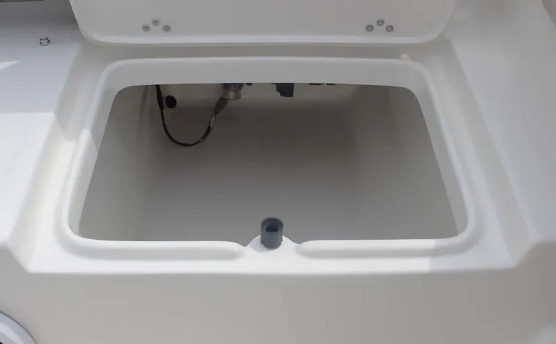Slide: The Image of Open storage compartment on 2025 Key West 239 FSR boat. - 32