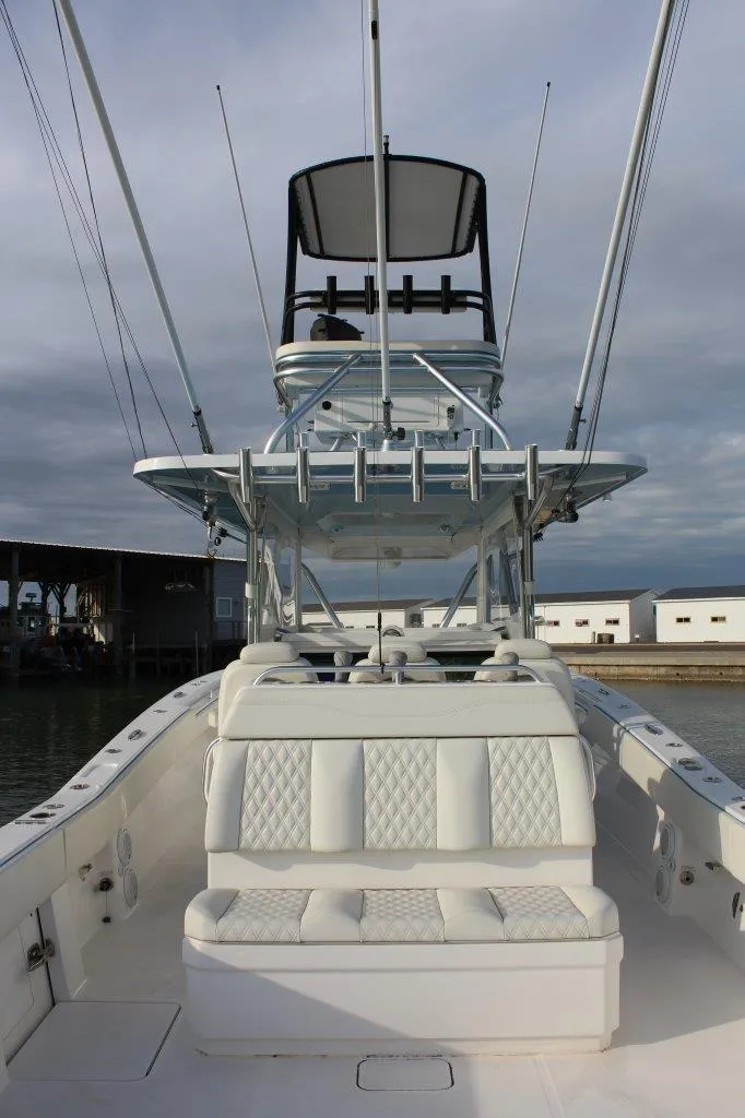 Slide: The Image of 2020 Invincible Center Cabin boat with spacious seating and modern design. - 5