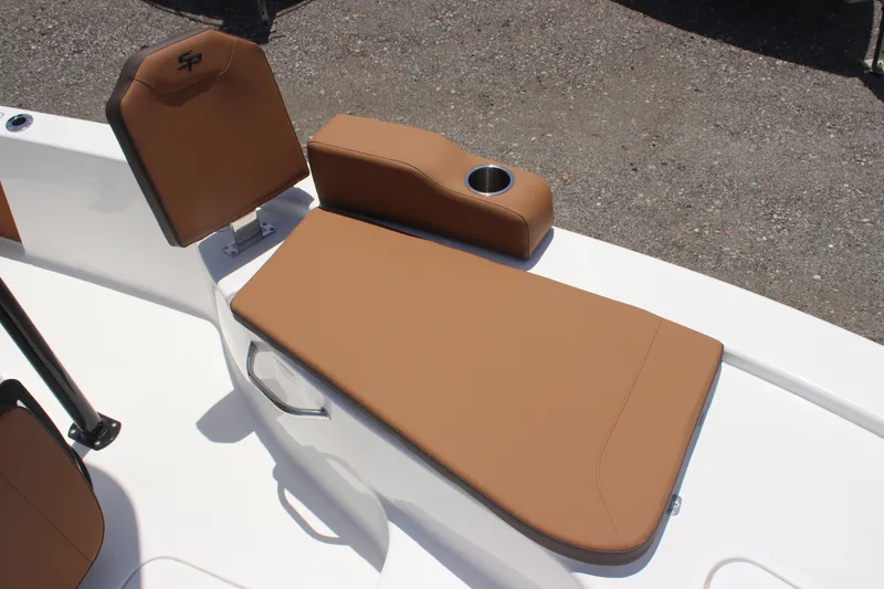 Slide: The Image of 2025 Sea Pro 230 Bay boat with tan seating and cup holder. - 11