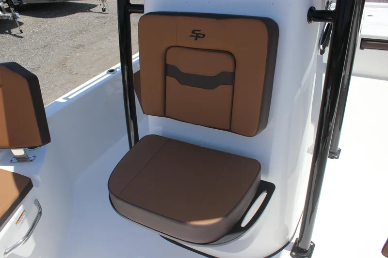 Slide: The Image of 2025 Sea Pro 230 Bay boat seat with brown cushions and black accents. - 12