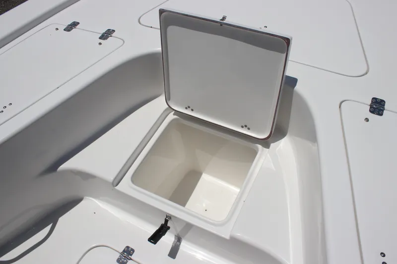 Slide: The Image of 2025 Sea Pro 230 Bay boat storage compartment with open hatch. - 8