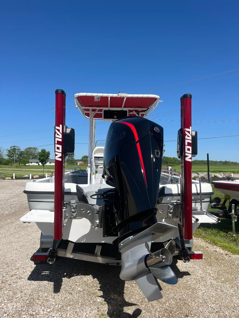 Slide: The Image of 2023 Charger 2230 L Sport boat with powerful outboard motor and Talon anchors. - 4