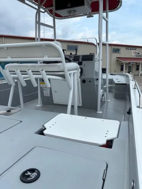 Slide: The Image of 2023 Charger 2230 L Sport boat interior with seating and control console. - 7