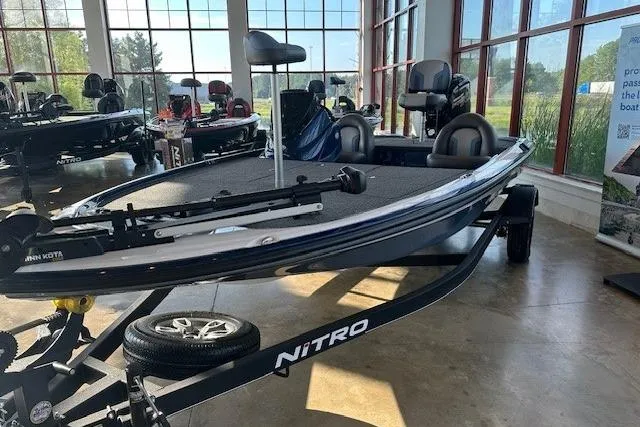Slide: The Image of 2025 Nitro Z17 boat in showroom, featuring sleek design and modern seating. - 1