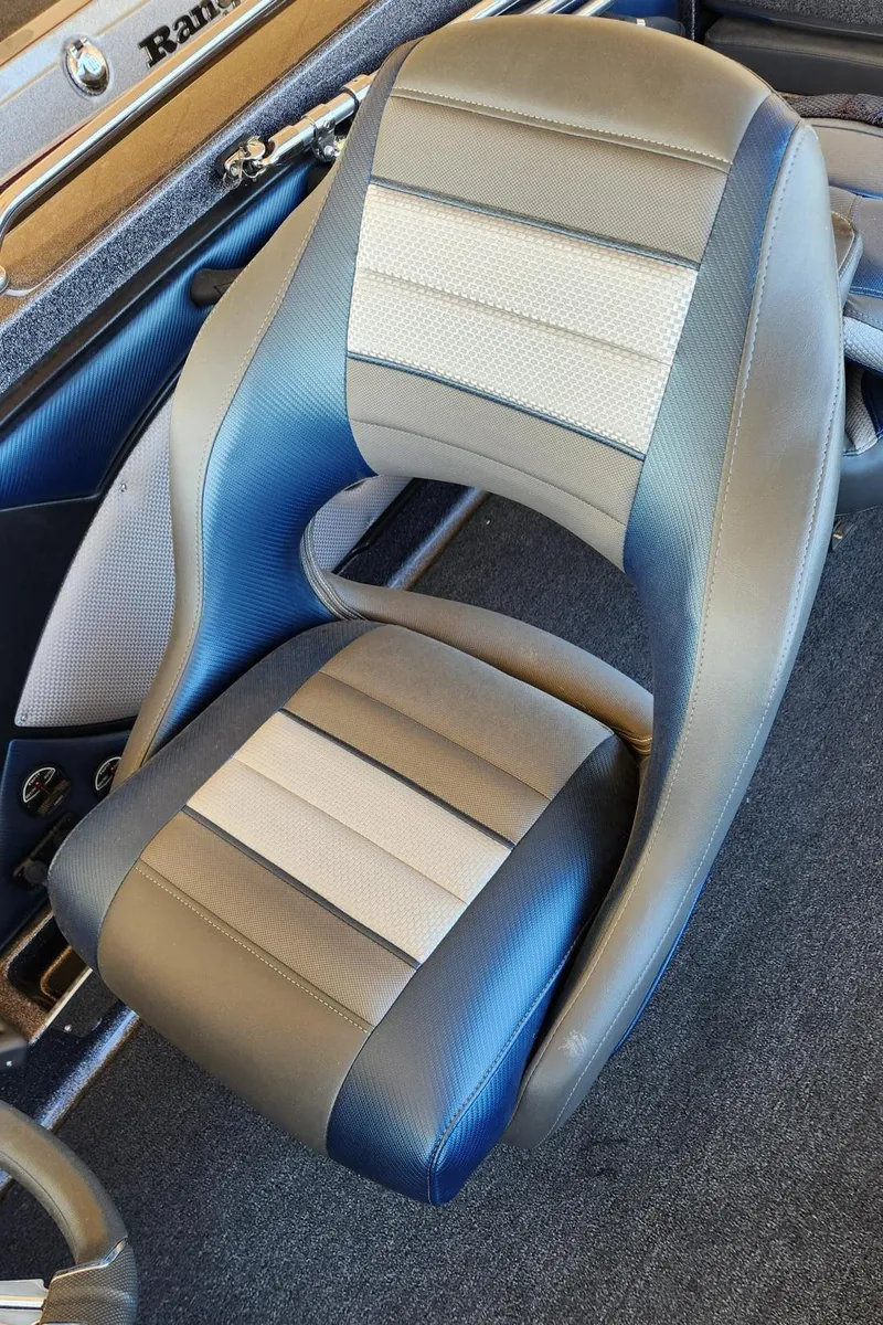 Slide: The Image of 2024 Ranger 1850MS boat seat with blue and gray upholstery. - 3