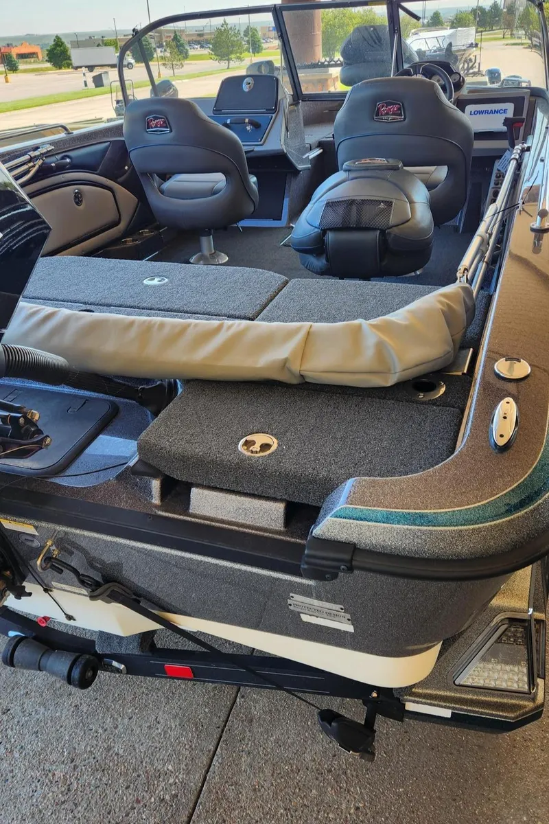 Slide: The Image of 2024 Ranger 1850MS boat interior with seating and storage, showcasing modern design and functionality. - 9