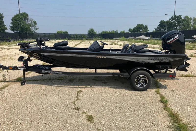 The Image of 2025 Ranger RT178 boat on trailer, black exterior, parked outdoors. - 0