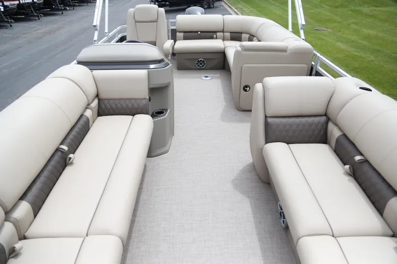 Slide: The Image of 2025 Sun Tracker Party Barge 20 DLX interior with spacious seating and modern design. - 2