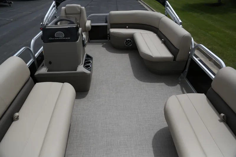 Slide: The Image of 2025 Sun Tracker Party Barge 16 DLX interior with spacious seating and modern design. - 2
