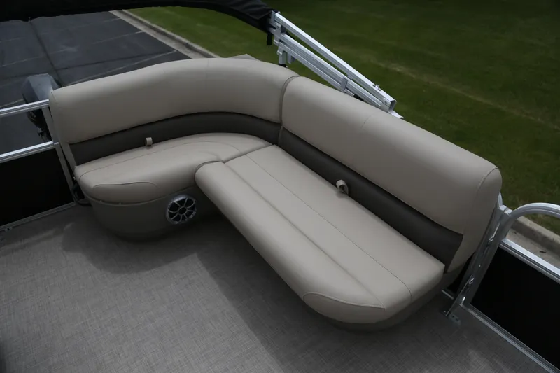Slide: The Image of 2025 Sun Tracker Party Barge 16 DLX pontoon seating with beige upholstery. - 3