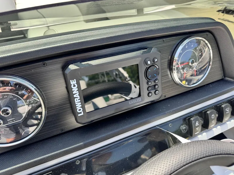 Slide: The Image of Dashboard of 2025 Godfrey Sweetwater 2086 SB with Lowrance navigation system. - 16