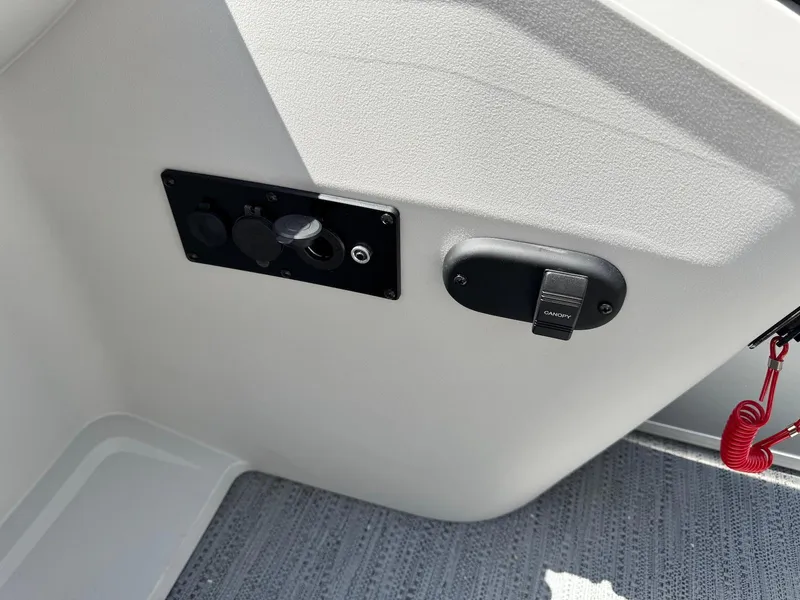 Slide: The Image of Control panel of 2025 Godfrey Sweetwater 2086 SB boat interior. - 17