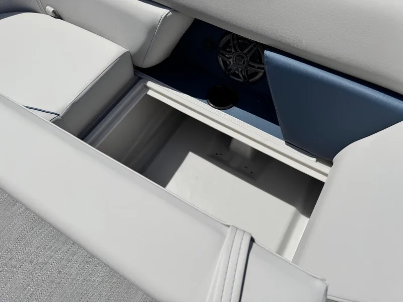 Slide: The Image of Interior storage compartment of 2025 Godfrey Sweetwater 2086 SB boat with cushioned seating. - 20