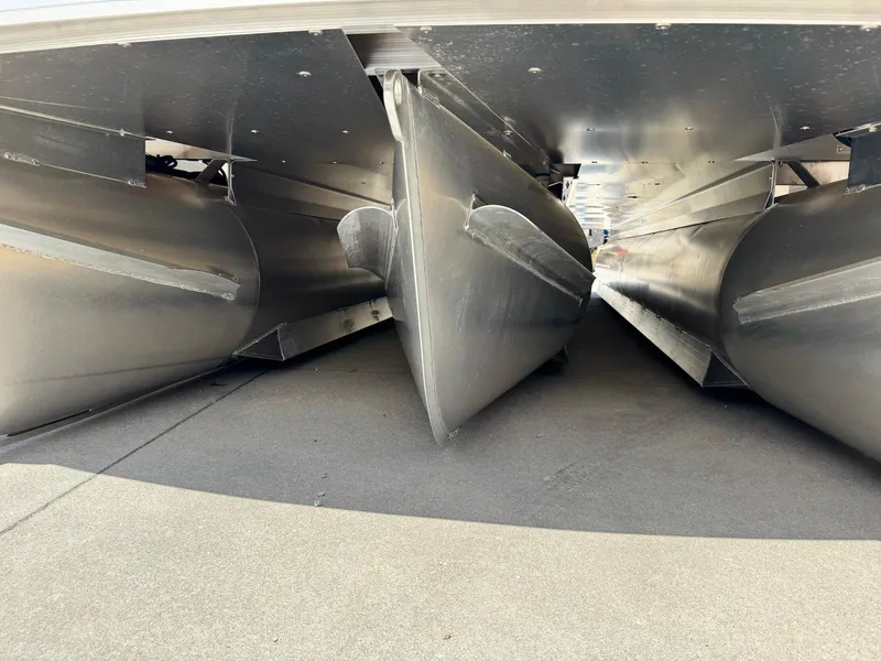 Slide: The Image of Underneath view of 2025 Godfrey Sweetwater 2086 SB pontoon boat, showcasing aluminum pontoons. - 23