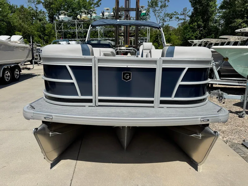 Slide: The Image of 2025 Godfrey Sweetwater 2086 SB pontoon boat in a marina setting. - 7