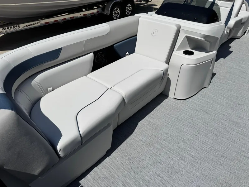 Slide: The Image of 2025 Godfrey Sweetwater 2086 SB boat interior with plush seating and modern design. - 9