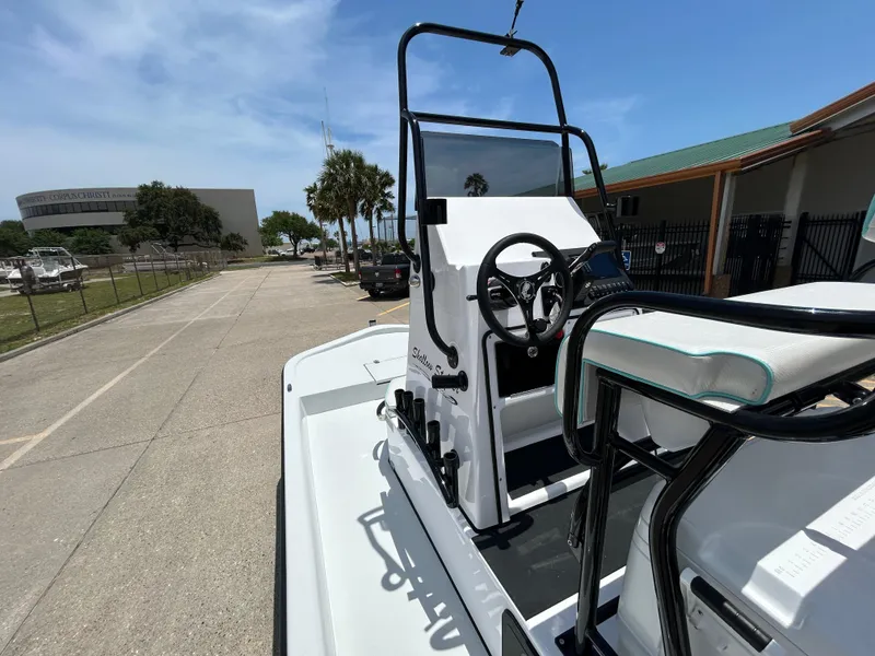 Slide: The Image of 2025 Shallow Stalker CAT 211 PRO boat, featuring sleek design and modern controls. - 11