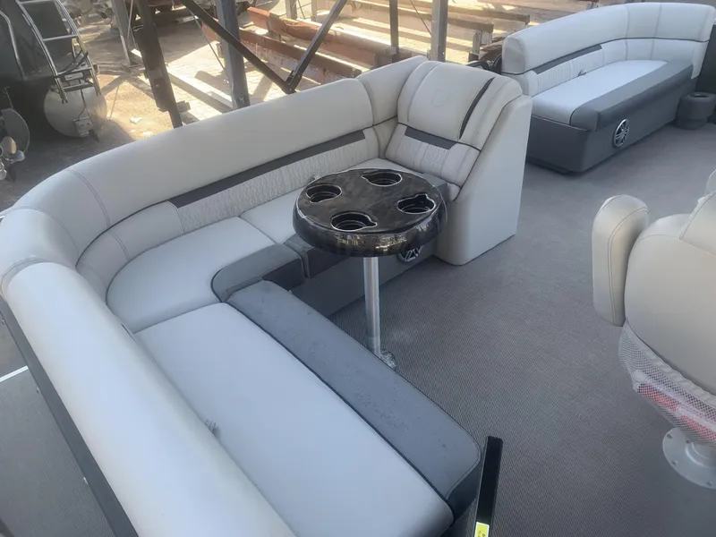 Slide: The Image of 2021 Godfrey Sweetwater 2086 BF pontoon boat interior with plush seating and cup holders. - 10