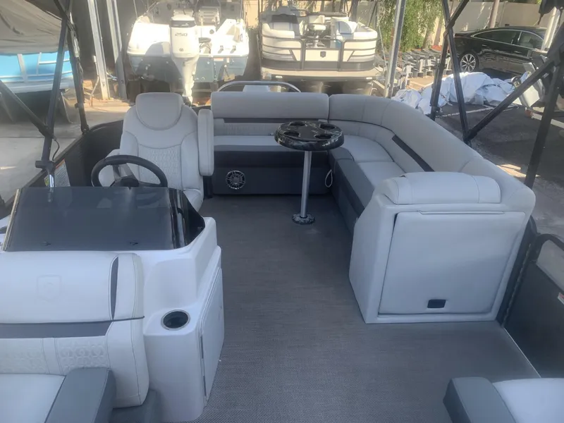 Slide: The Image of 2021 Godfrey Sweetwater 2086 BF pontoon boat interior with seating and steering console. - 3