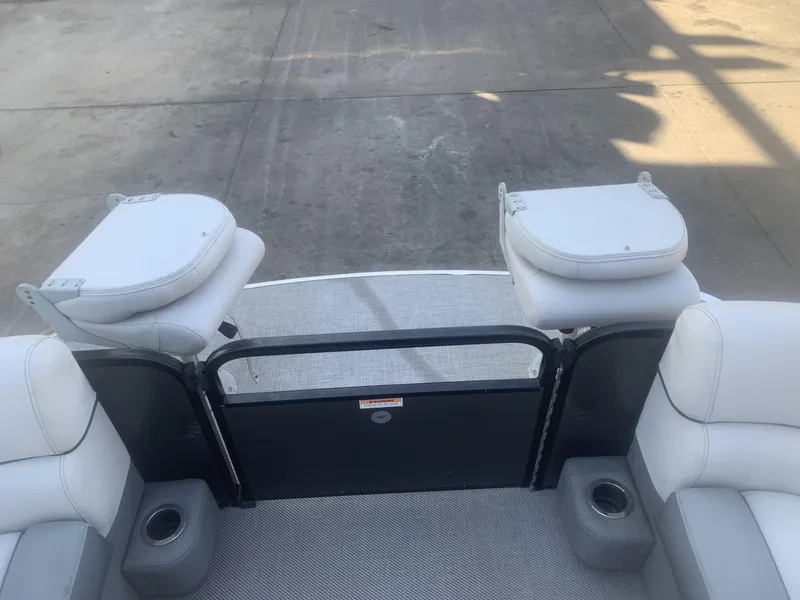 Slide: The Image of 2021 Godfrey Sweetwater 2086 BF boat interior with seating and gate. - 4