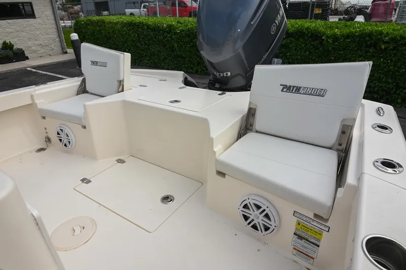 Slide: The Image of Open storage compartment on 2021 Pathfinder 2500 Hybrid boat deck. - 11