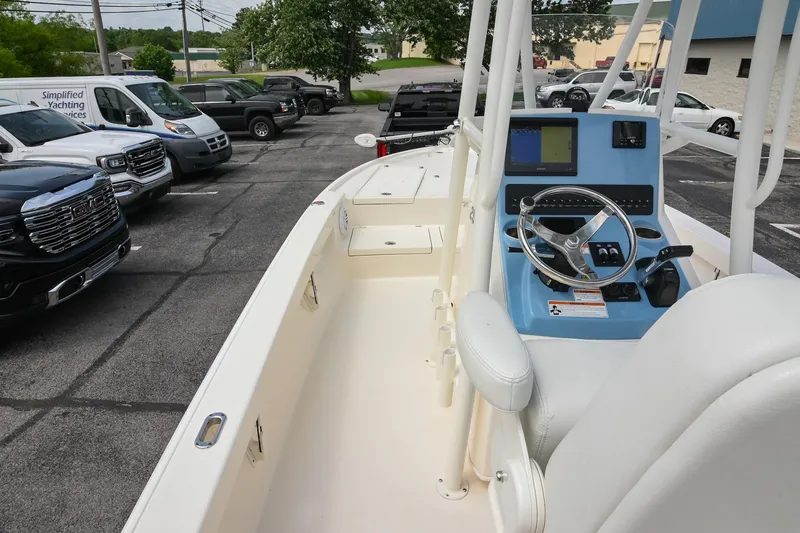 Slide: The Image of Control panel of a 2021 Pathfinder 2500 Hybrid boat, featuring navigation and electronic displays. - 20