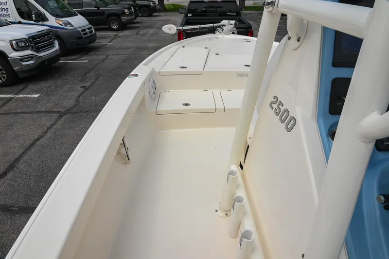 Slide: The Image of 2021 Pathfinder 2500 Hybrid boat interior with seating and storage compartments. - 30