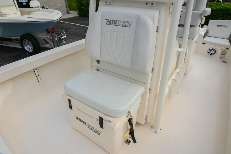 Slide: The Image of Open storage compartment on 2021 Pathfinder 2500 Hybrid boat deck. - 31