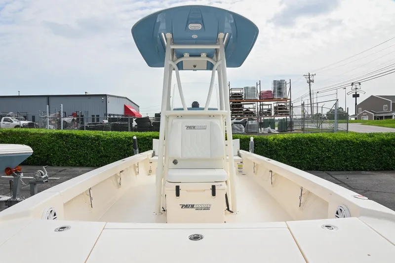 Slide: The Image of 2021 Pathfinder 2500 Hybrid boat interior with cushioned seating and storage compartments. - 9
