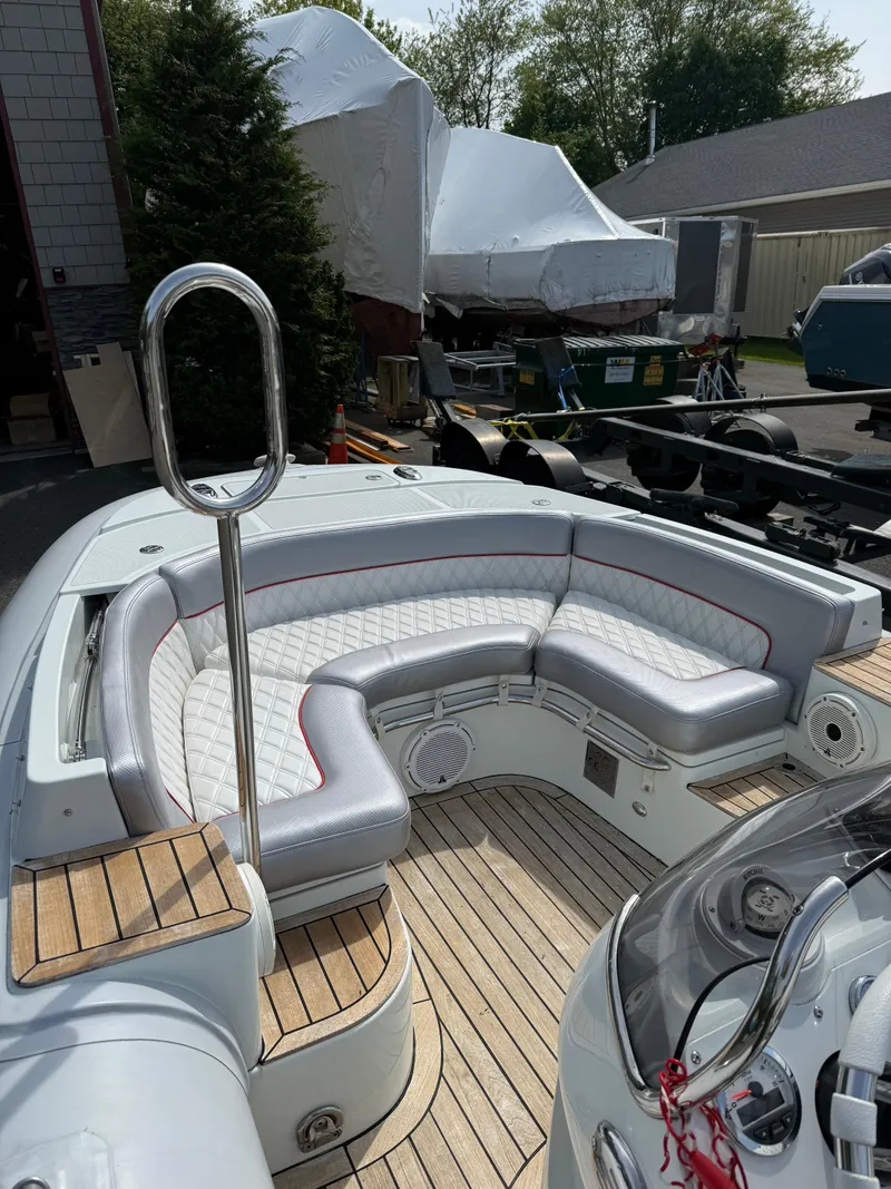 Slide: The Image of 2015 Castoldi 21 Diesel Jet Tender with sleek seating and modern design. - 11