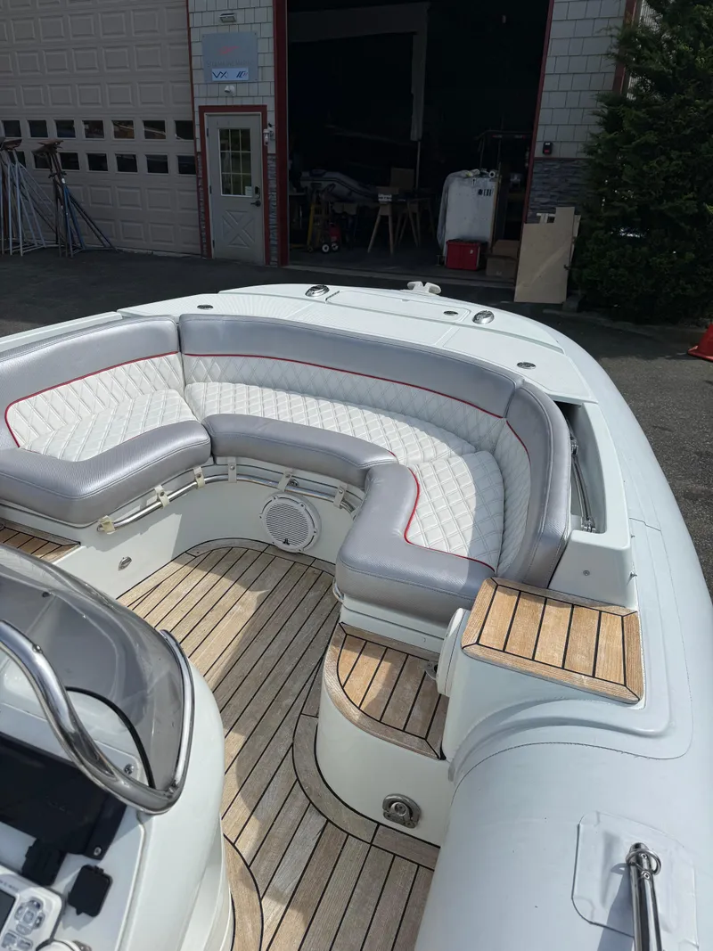 Slide: The Image of 2015 Castoldi 21 Diesel Jet Tender with elegant seating and teak flooring. - 12