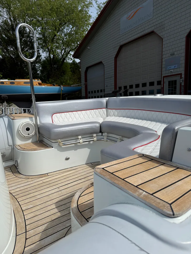 Slide: The Image of 2015 Castoldi 21 Diesel Jet Tender with teak decking and cushioned seating. - 17